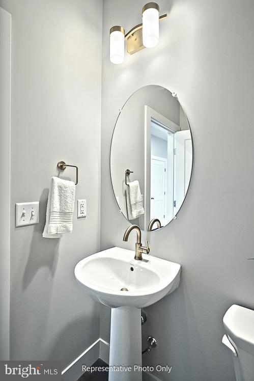 116 Washington Crossing York, PA 17404 - Photo 23 of 32 a bathroom with a sink and a mirror