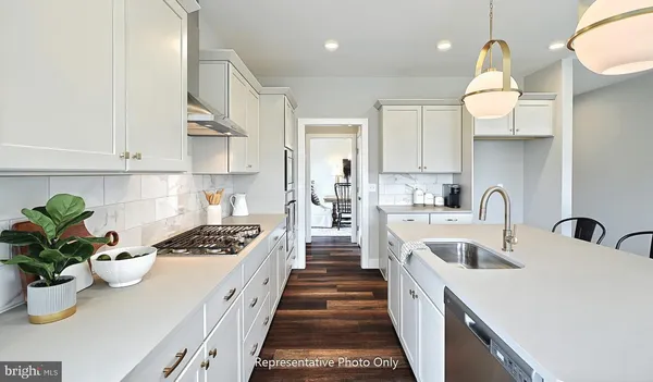a kitchen with counter top space and appliances