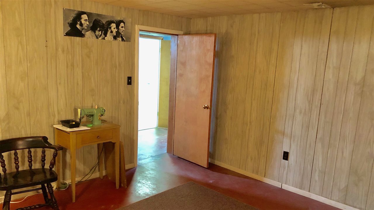 1511 Warren Road Rockford, IL 61108 - Photo 10 of 14 a view of a bathroom with a table and chairs