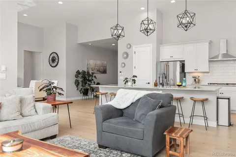 a spacious bedroom with a bed and window