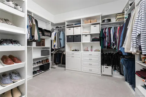 a view of a patio with couches and potted plants