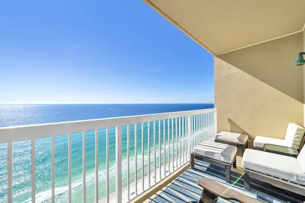 a balcony with wooden floor