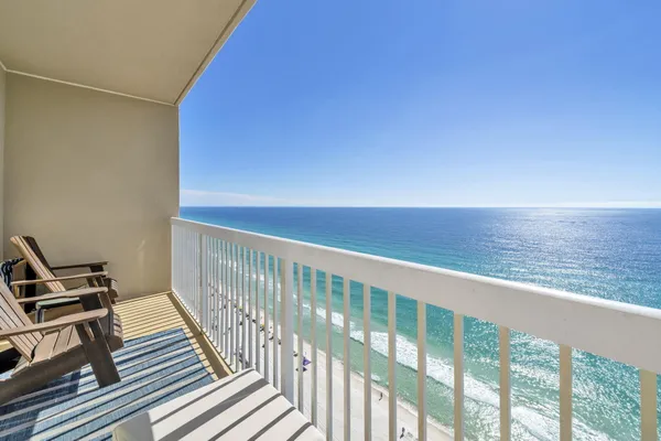 a view of a balcony with an outdoor space
