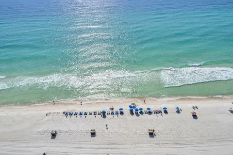 a view of a balcony with ocean view
