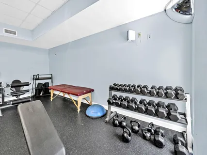 a view of a room with gym equipment