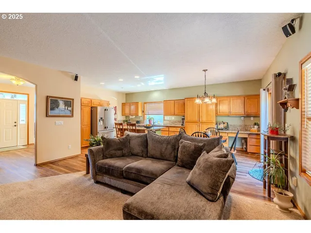 a bathroom with a toilet sink vanity and mirror