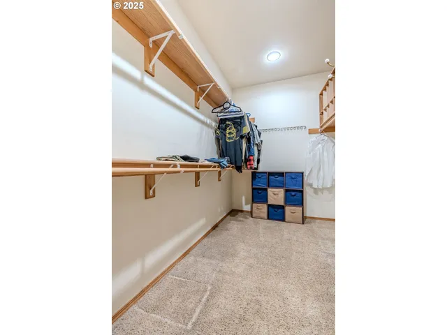 a utility room with sink dryer and washer