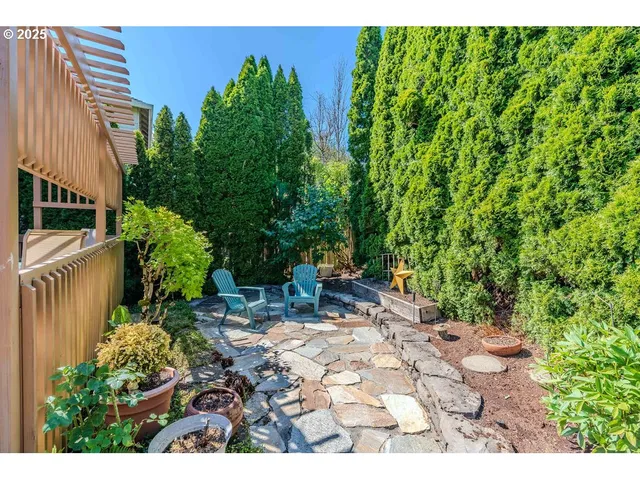a backyard of a house with lots of green space