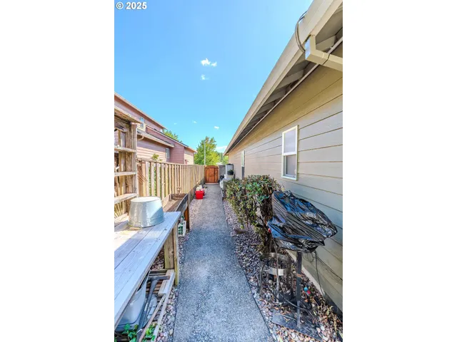 a backyard of a house with lots of green space