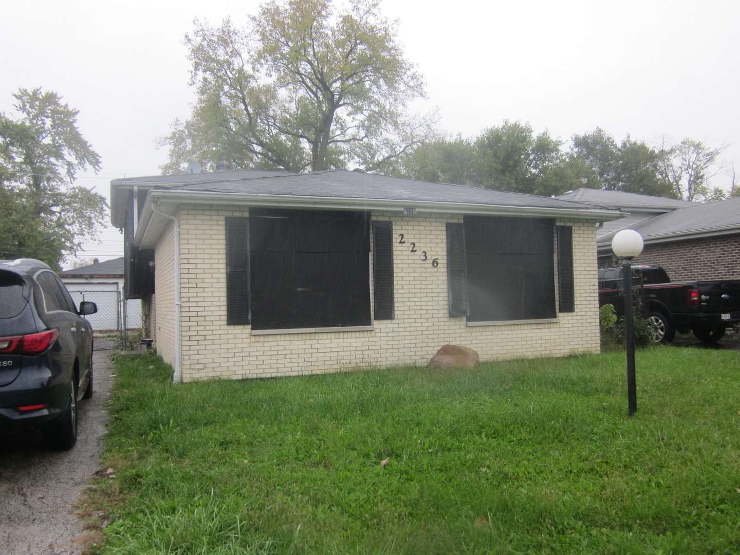2236 West 157th Place Markham, IL 60426 - Photo 2 of 13 a view of house with backyard
