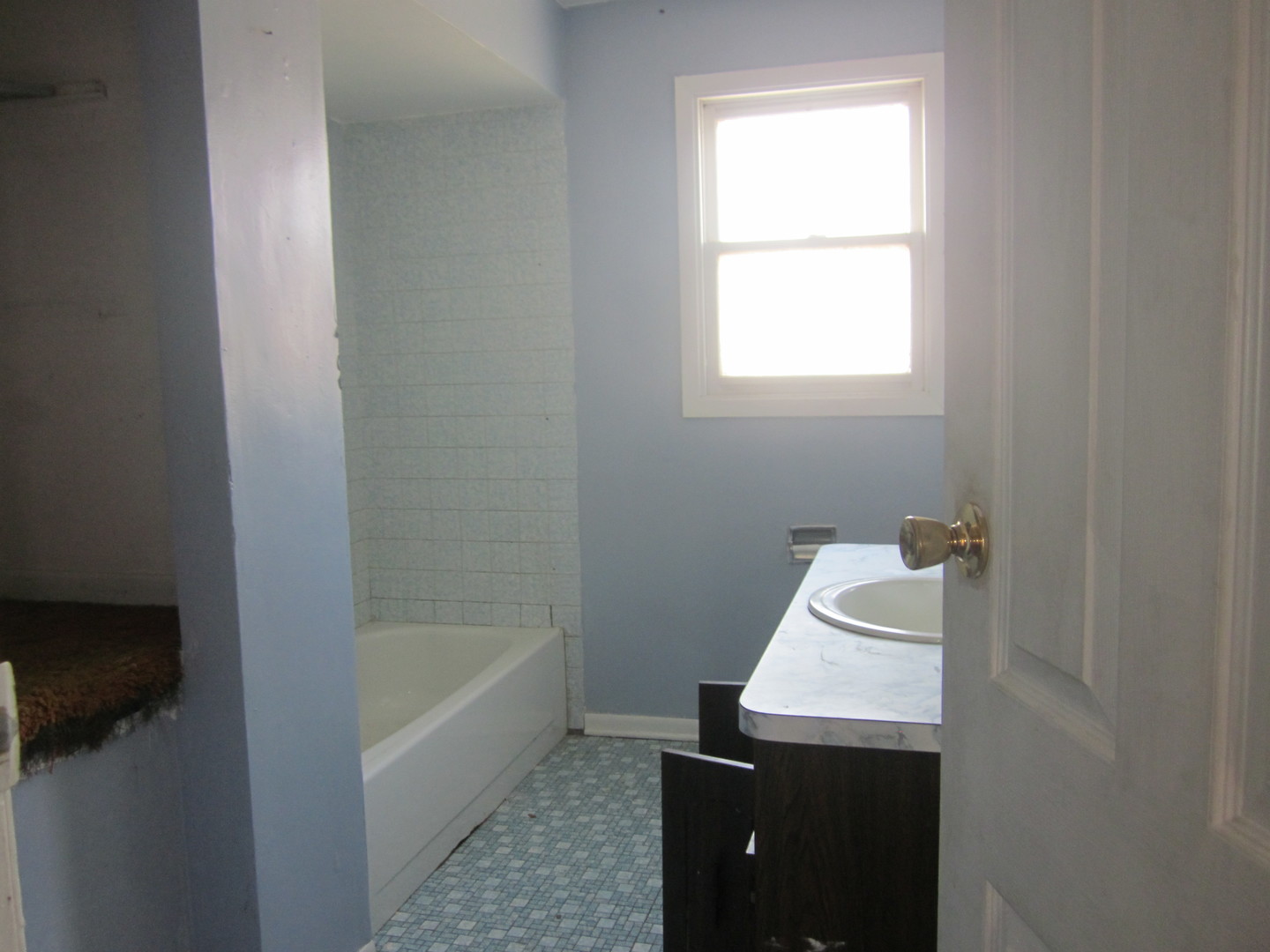 2236 West 157th Place Markham, IL 60426 - Photo 8 of 13 a bathroom with a sink toilet and tub