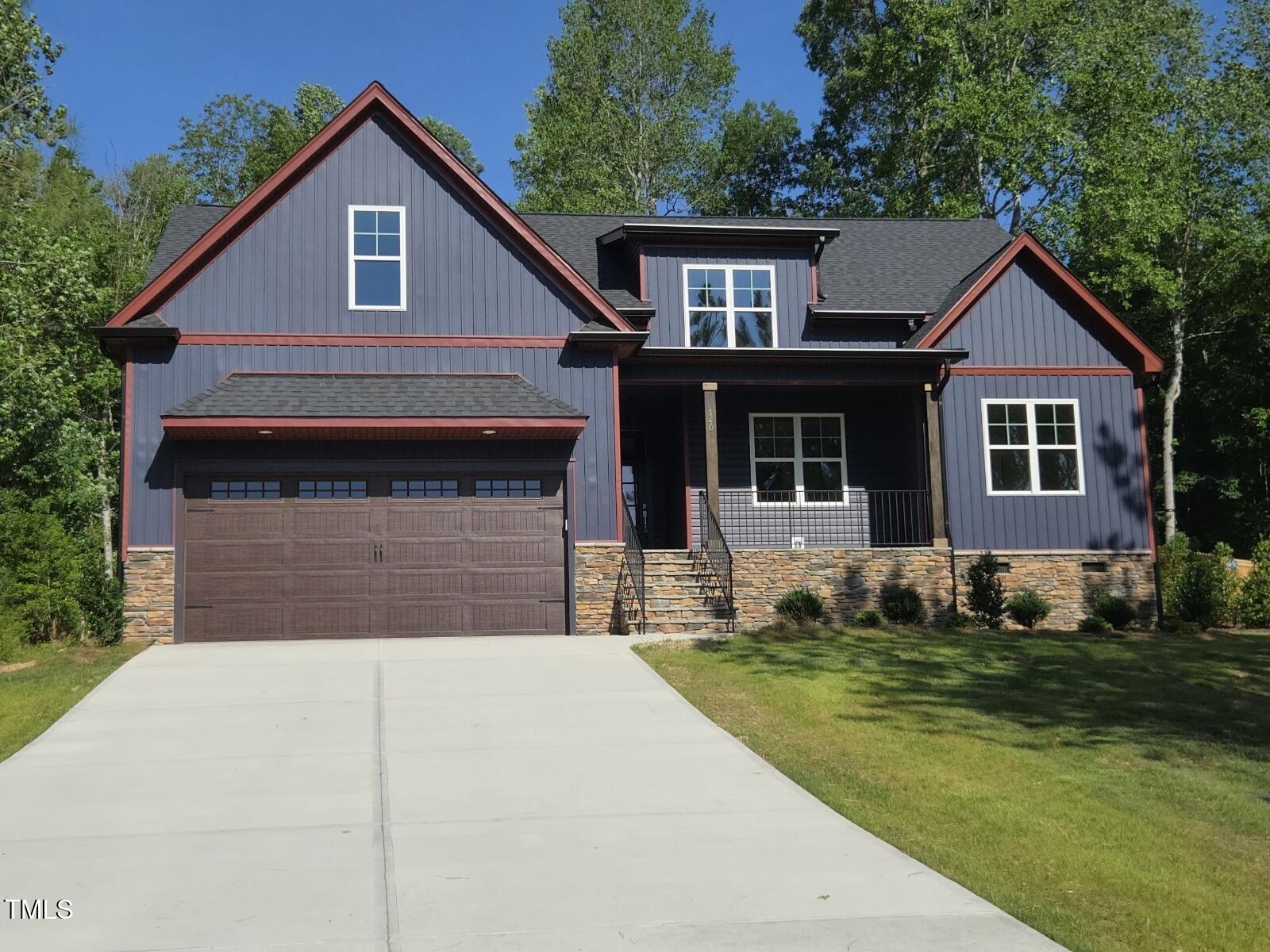 140 Pilot Ridge Road Zebulon, NC 27597 - Photo 1 of 29 a front view of a house with a yard