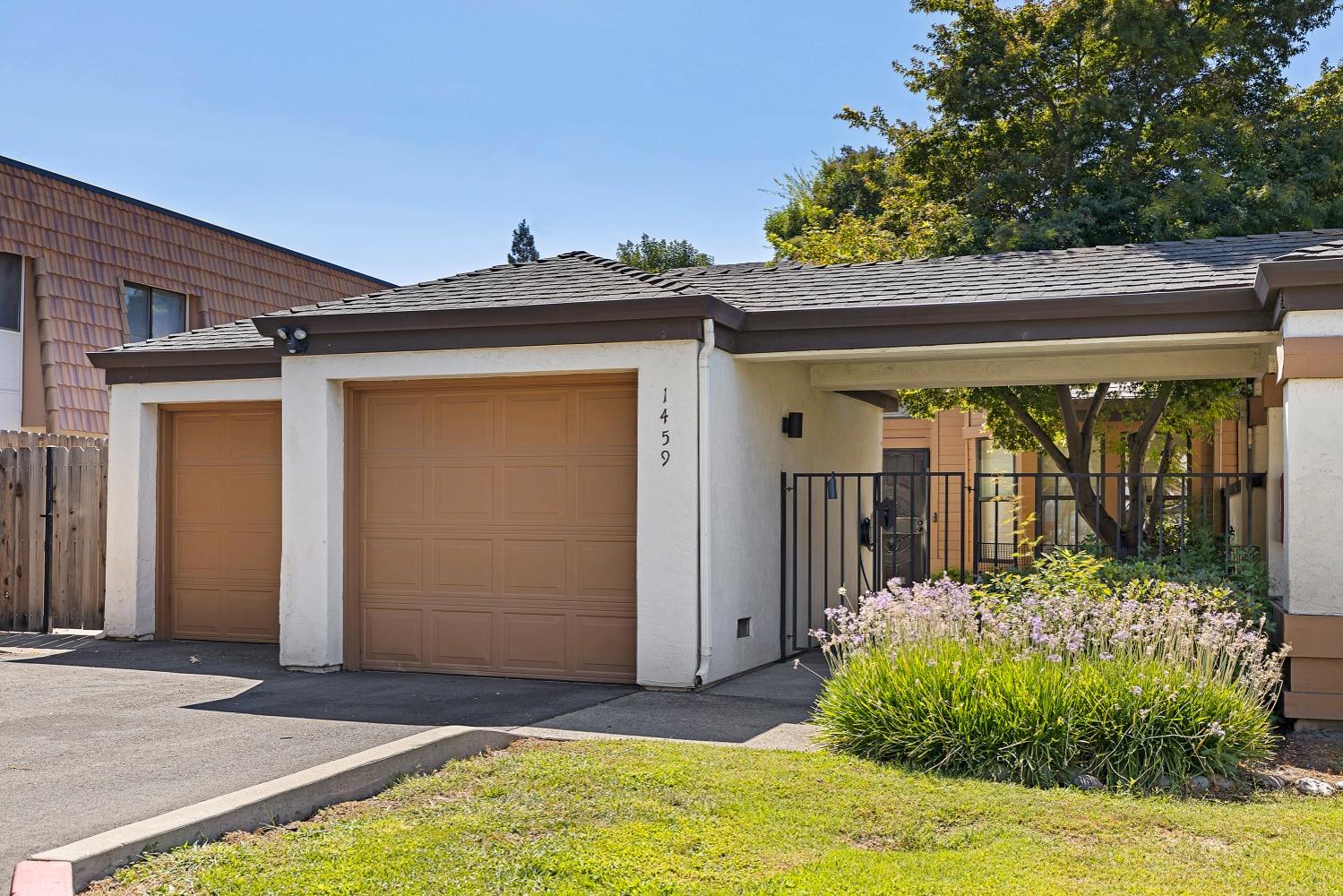 1459 West Swain Road Stockton, CA 95207 - Photo 1 of 1 End unit . Courtyard entry, two car garage