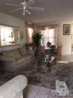 832 Pontoon Way Oxnard, CA 93035 - Photo 2 of 24 a living room with furniture and a large window