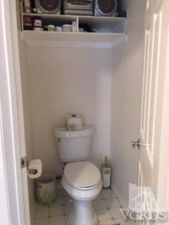 832 Pontoon Way Oxnard, CA 93035 - Photo 13 of 24 a white toilet sitting next to a bathroom sink