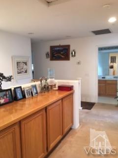 832 Pontoon Way Oxnard, CA 93035 - Photo 15 of 24 a spacious bathroom with a double vanity sink and a mirror