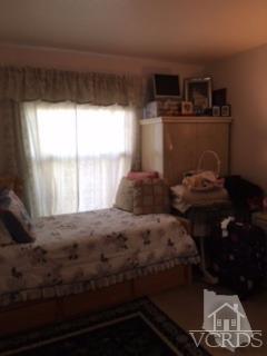 832 Pontoon Way Oxnard, CA 93035 - Photo 16 of 24 a bed sitting in a bedroom next to a window