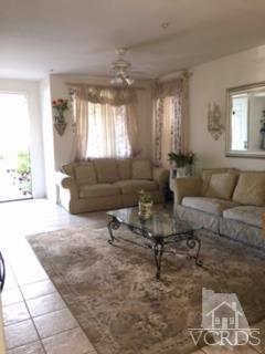 832 Pontoon Way Oxnard, CA 93035 - Photo 3 of 24 a living room with furniture and a large window