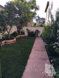 832 Pontoon Way Oxnard, CA 93035 - Photo 21 of 24 a view of a garden with a fountain