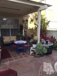 832 Pontoon Way Oxnard, CA 93035 - Photo 23 of 24 a backyard of a house with outdoor seating