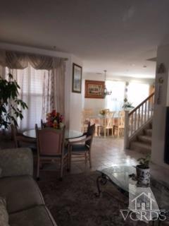 832 Pontoon Way Oxnard, CA 93035 - Photo 4 of 24 a room with lots of furniture and a painting on the wall