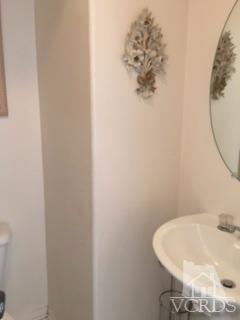 832 Pontoon Way Oxnard, CA 93035 - Photo 5 of 24 a bathroom with a sink and a mirror