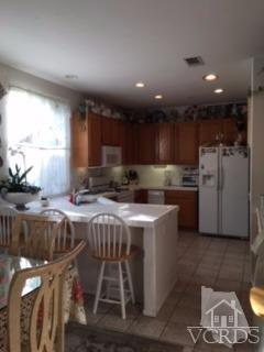 832 Pontoon Way Oxnard, CA 93035 - Photo 6 of 24 a kitchen that has a sink and a stove in it
