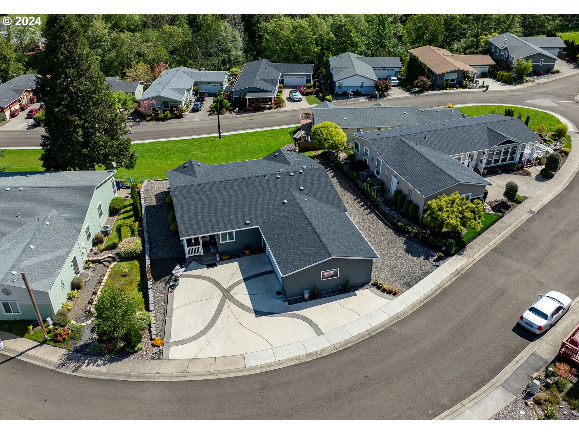 204 Lucky Ridge Loop Canyonville, OR 97417 - Photo 3 of 41 an aerial view of a house with a swimming pool