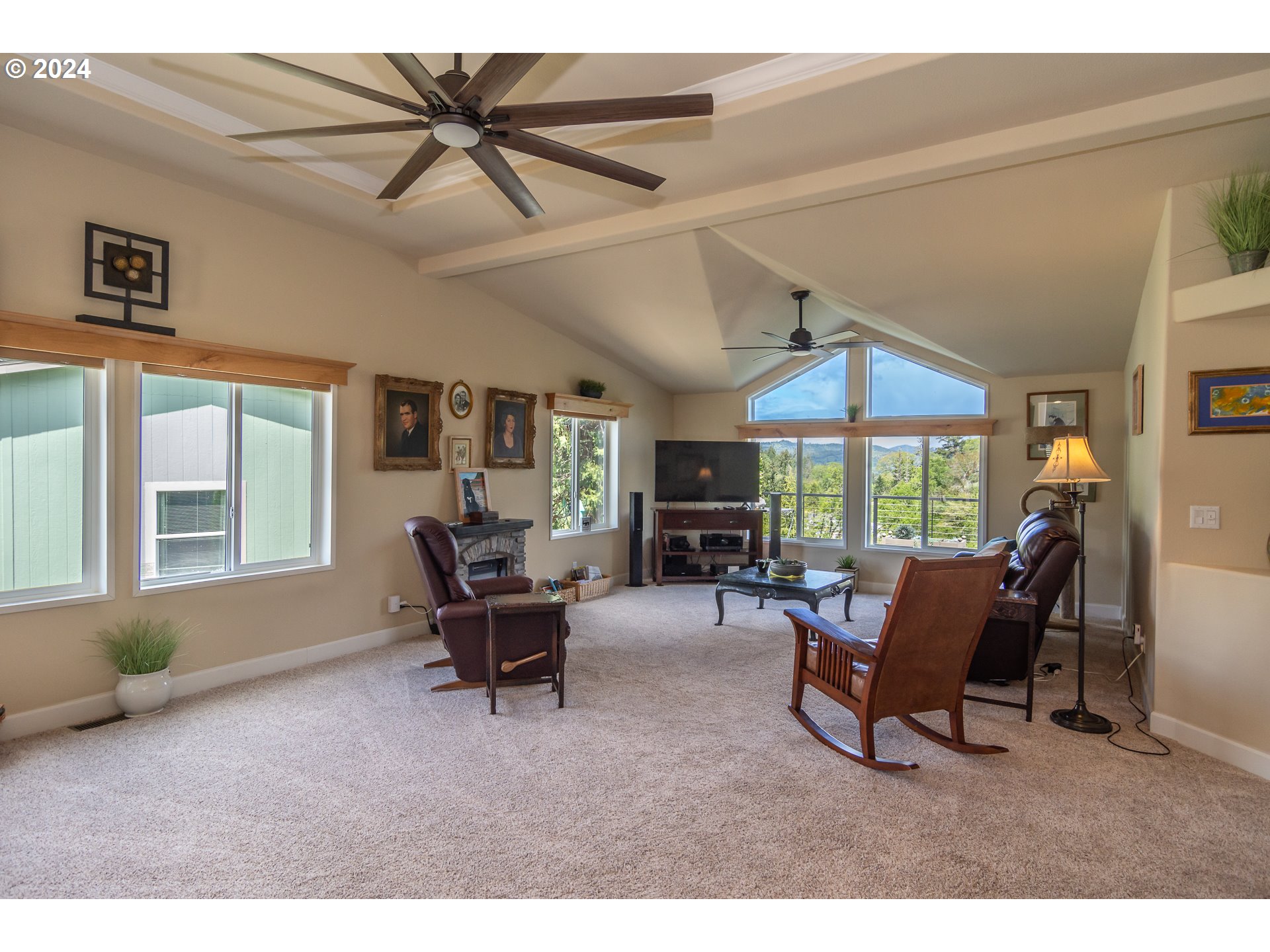 204 Lucky Ridge Loop Canyonville, OR 97417 - Photo 5 of 41 a living room with furniture and a large window
