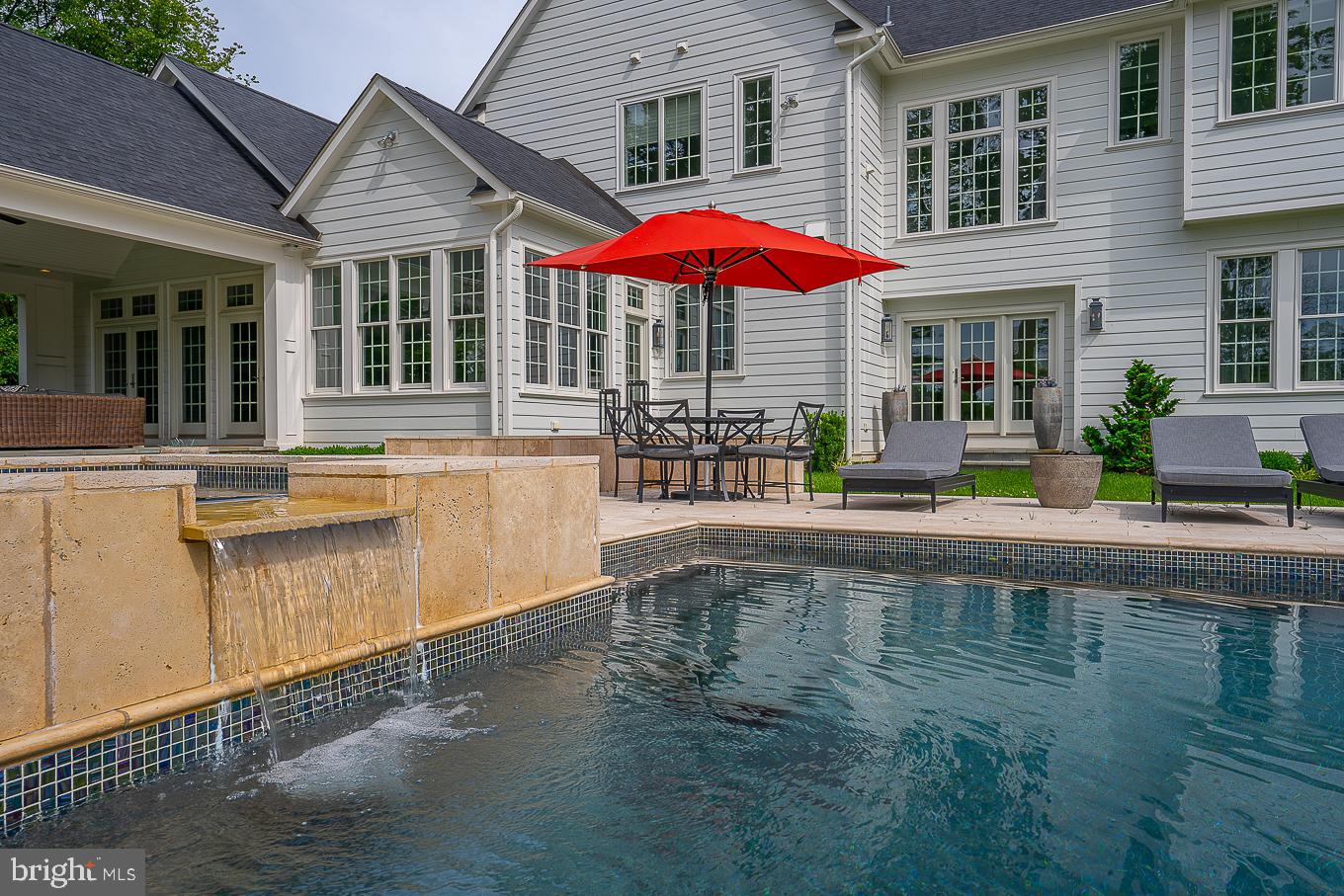218 Berkley Road Devon, PA 19333 - Photo 53 of 65 Waterfall from Jacuzzi to Pool