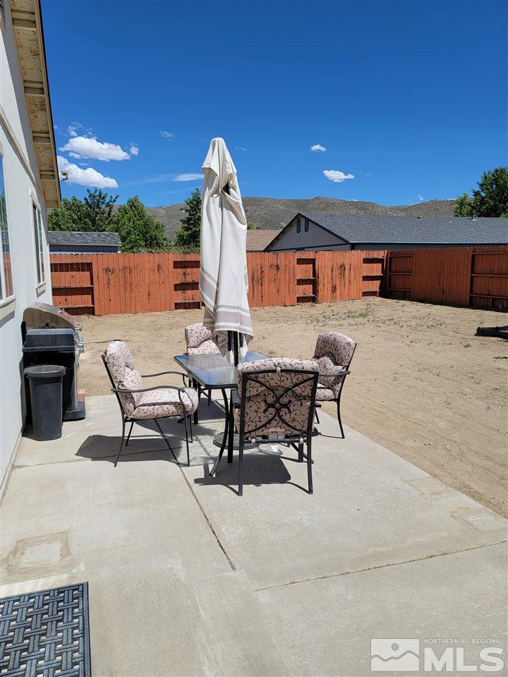 17756 Fortune Court Reno, NV 89508 - Photo 28 of 28 a view of a chairs and tables in the patio