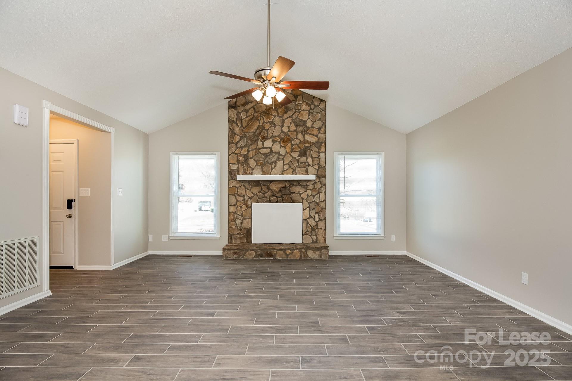 124 Shade Tree Court Gastonia, NC 28056 - Photo 3 of 16 a view of an empty room with a window