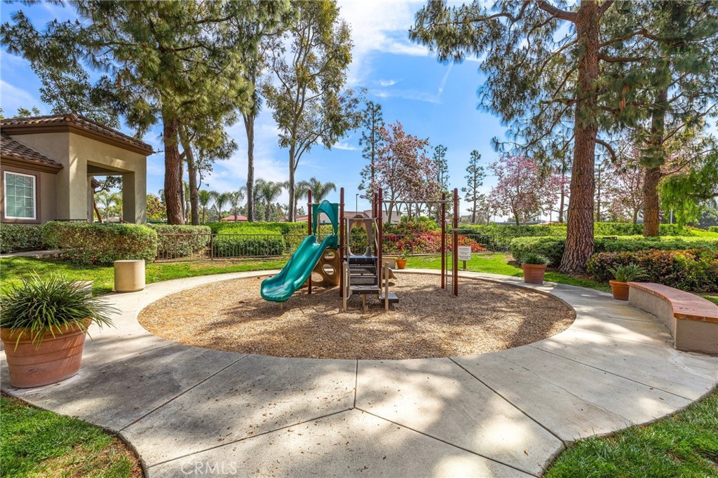 2800 Keller Drive, Unit 262 Tustin, CA 92782 - Photo 24 of 41 a view of a park with swings and slides