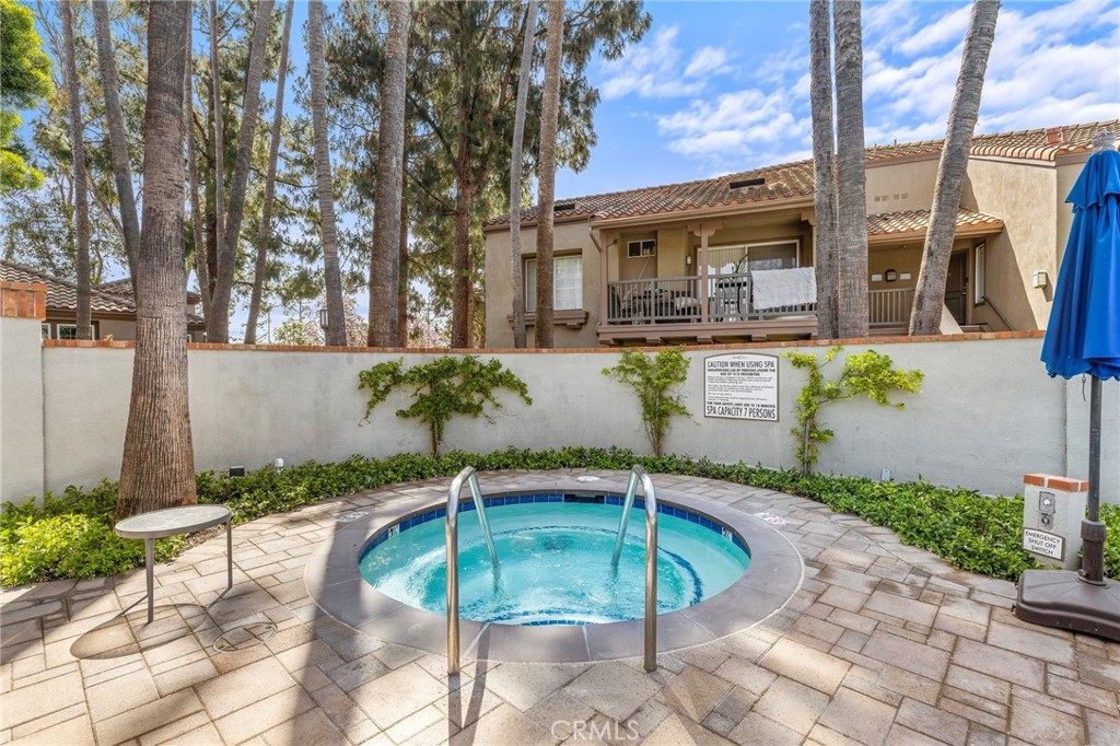 2800 Keller Drive, Unit 262 Tustin, CA 92782 - Photo 28 of 41 a view of a house with backyard and sitting area