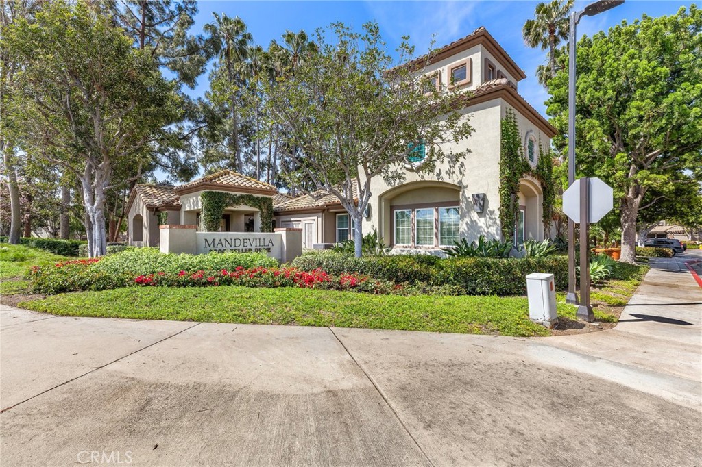 2800 Keller Drive, Unit 262 Tustin, CA 92782 - Photo 3 of 41 a front view of a house with a yard
