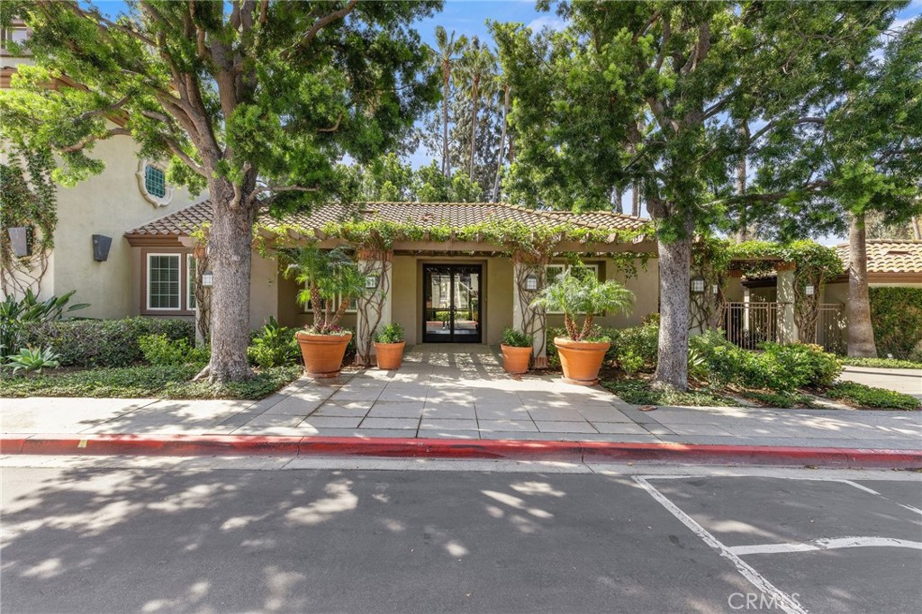 2800 Keller Drive, Unit 262 Tustin, CA 92782 - Photo 31 of 41 a front view of a house with yard porch and outdoor seating