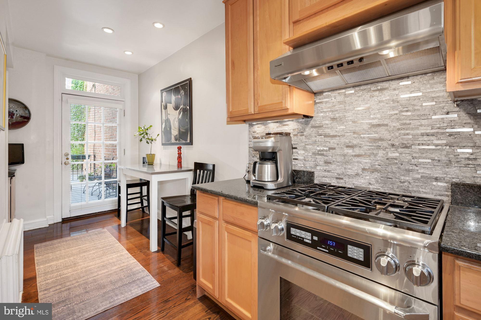3346 Reservoir Road Northwest Washington, DC 20007 - Photo 11 of 30 Kitchen | Breakfast | Opening to Deck