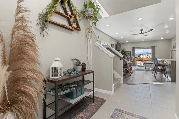 a view of livingroom with furniture and stairs