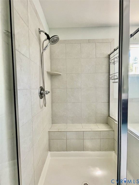 9506 Simonsville Road Midlothian, VA 23112 - Photo 18 of 27 a bathroom with a shower