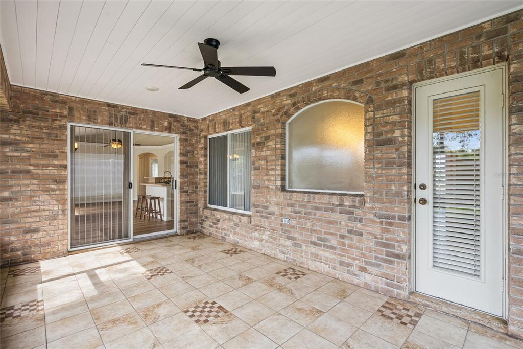 893 Watt Circle Deltona, FL 32738 - Photo 27 of 34 a bathroom with a mirror and a shower