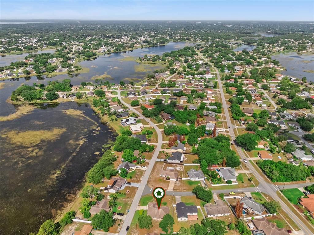 893 Watt Circle Deltona, FL 32738 - Photo 34 of 34 an aerial view of residential houses with outdoor space