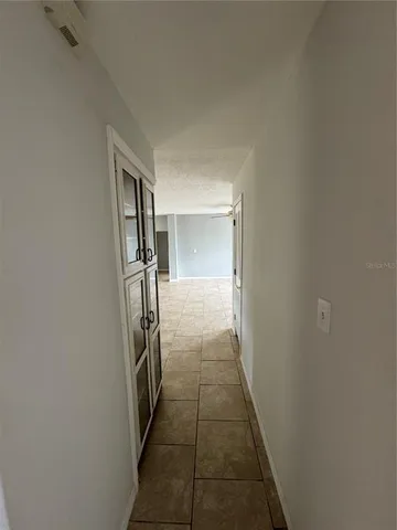 a view of hallway with stairs