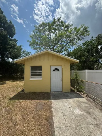 a view of backyard of house