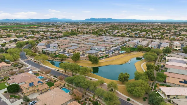 a aerial view of a house with a ocean view
