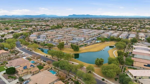 a view of a swimming pool with an outdoor seating