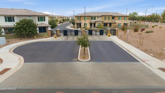 a view of a swimming pool with an outdoor seating