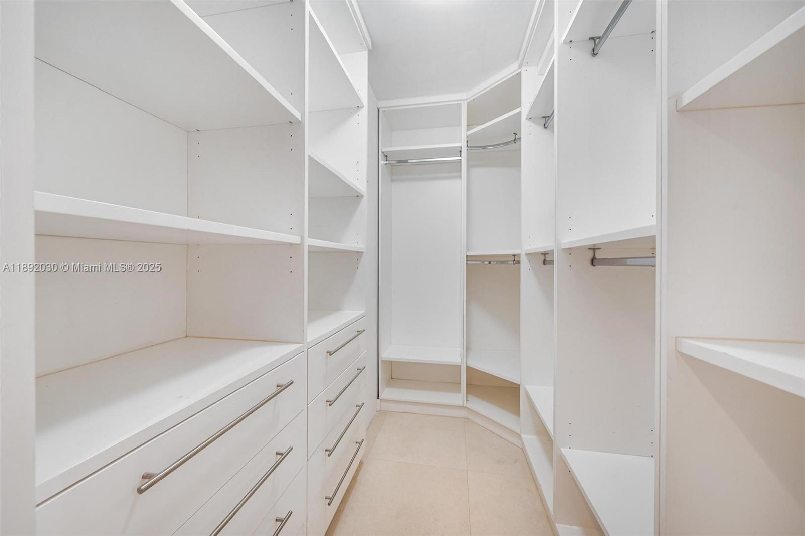6365 Collins Avenue, Unit 2901 Miami Beach, FL 33141 - Photo 22 of 44 a view of an empty walk in closet