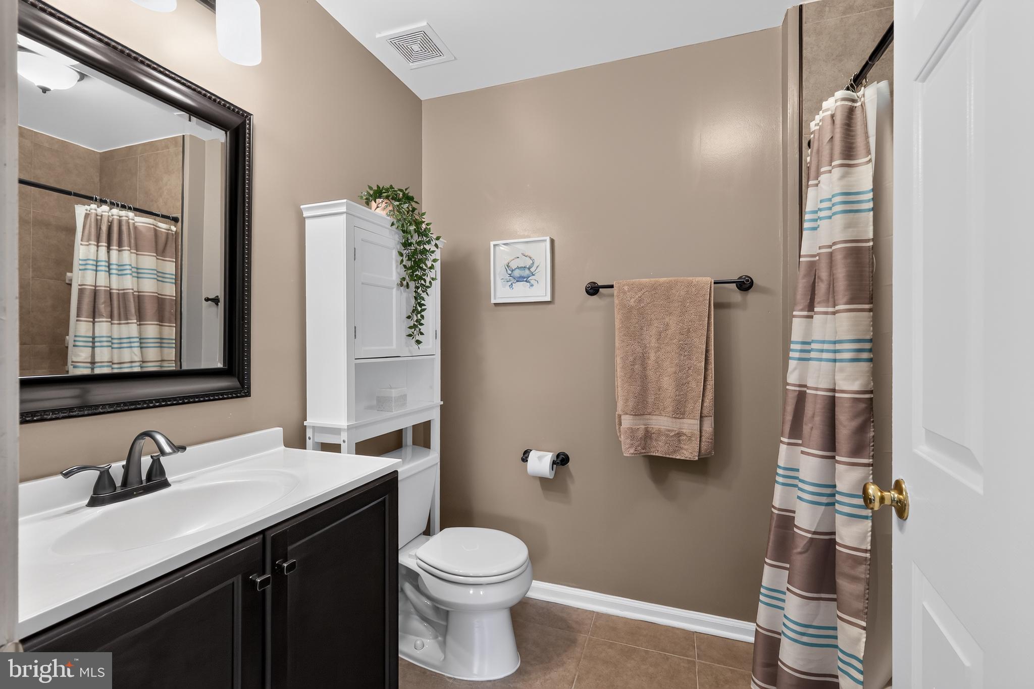 10100 Ridge Manor Terrace, Unit 5000L Damascus, MD 20872 - Photo 11 of 15 Chic bathroom #1 with modern accents.