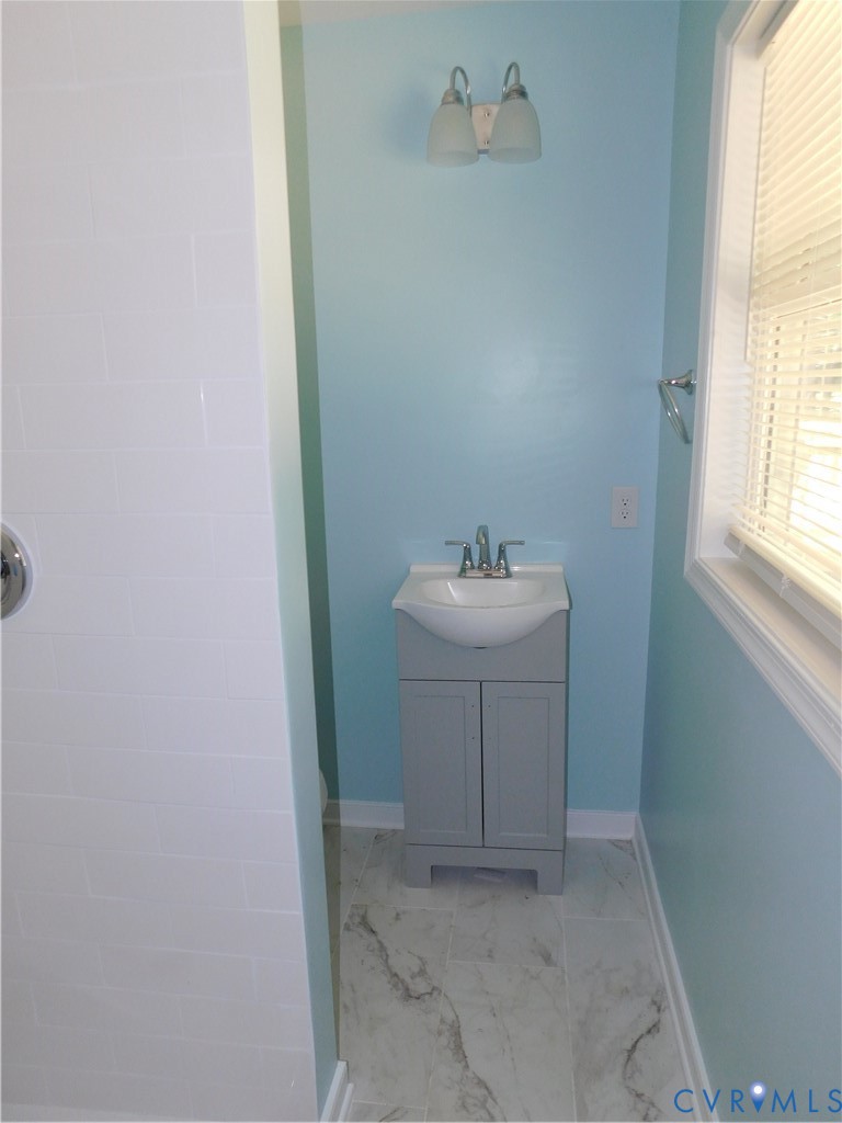 5322 Adams Road Quinton, VA 23141 - Photo 22 of 56 Master bath Vanity with integrated basin, light gr