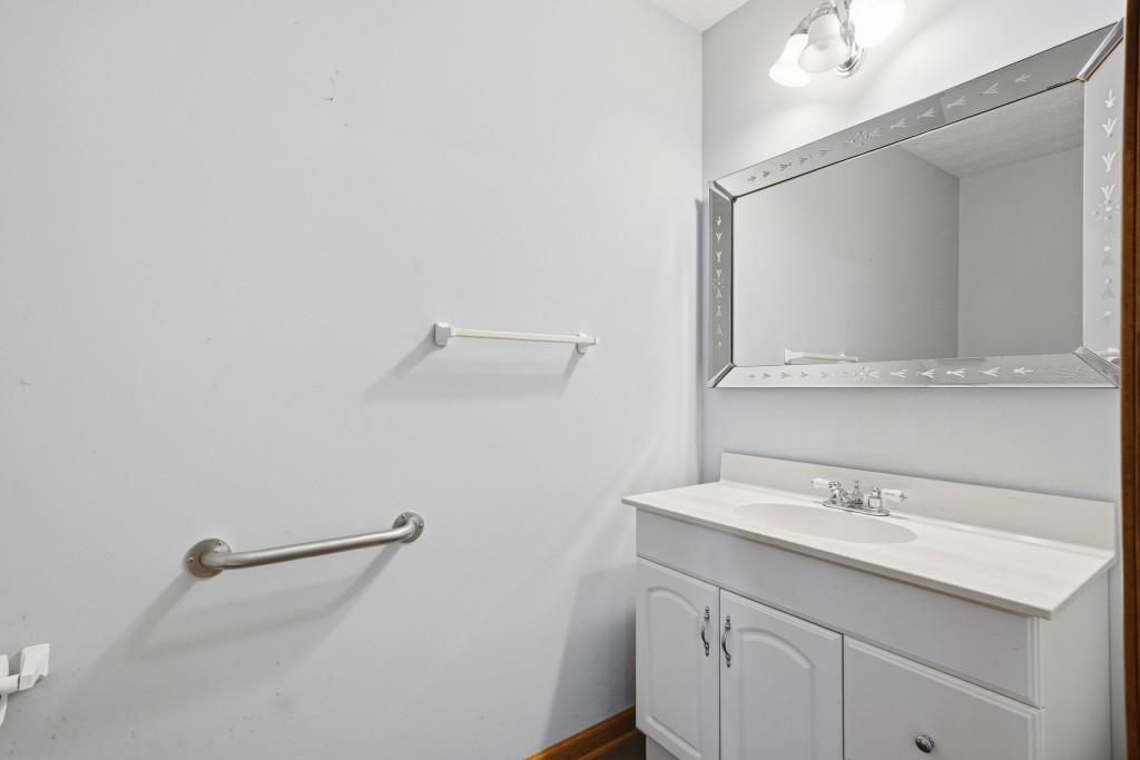 176 Big Oak Tree Road Northwest Adairsville, GA 30103 - Photo 25 of 77 a bathroom with a sink and a mirror